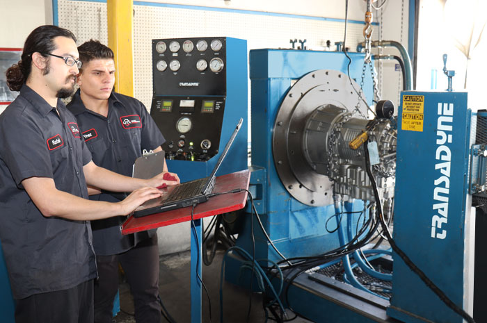 Two Employees Working on Transdyne